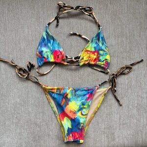 melissa simone colourful and cheetah leopard print string bikini top and bottom.